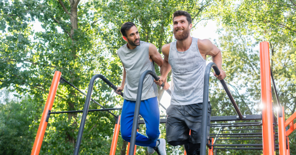 two men at a fitness/callisthenics park